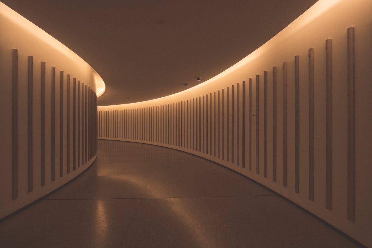 Warm architectural corridor with concealed light